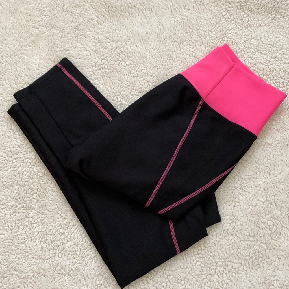 Black and hot pink leggings